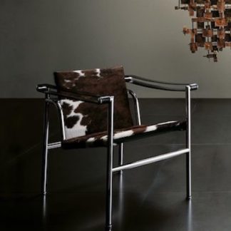 LC1LC1 - armchair - black enamel frame - seat and back in hairyskin with black leather arm straps
